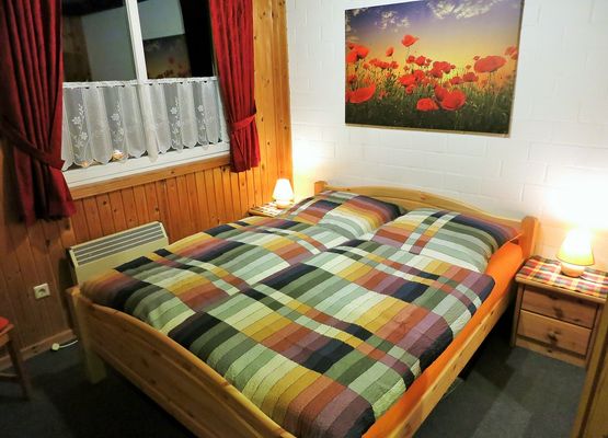 Schlafzimmer EG mit Bett 1,60m x 2,00m, Ferienhaus Sophie, Ferienhäuser Marx
